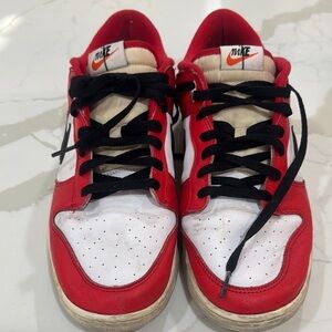 Nike Red and White Athletic Shoes with Classic Design